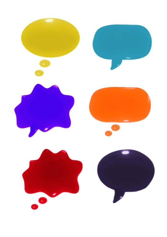 a set of four different color and shape speech bubbles