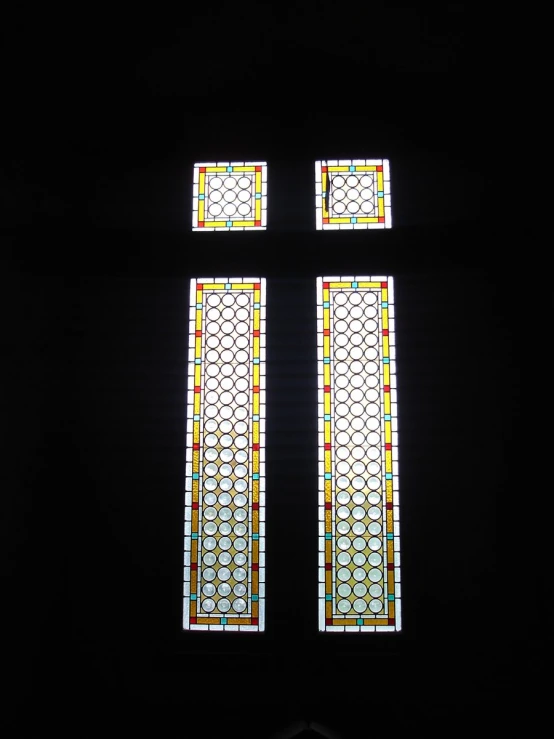 a view of some stained glass from inside