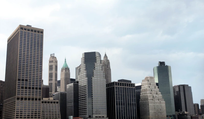 a row of tall buildings near a body of water