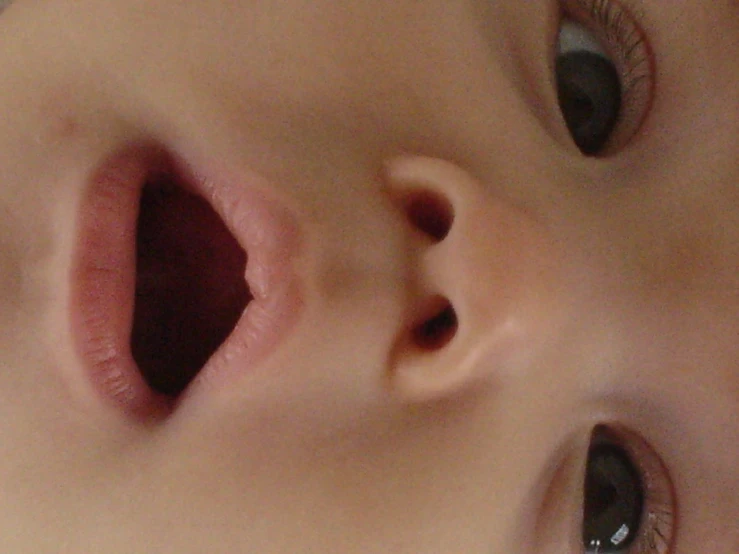 an extreme closeup view of a baby's nose