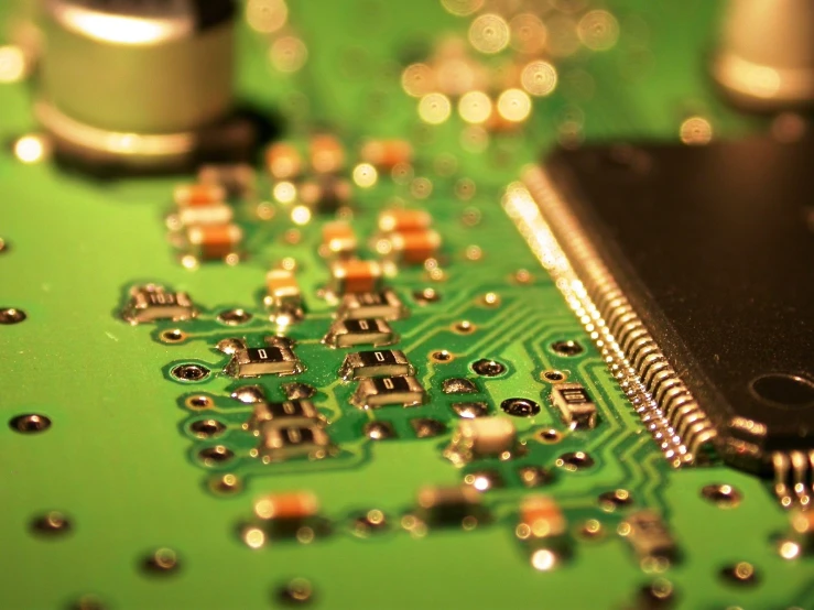 an electronic device circuit board with lots of chip chips