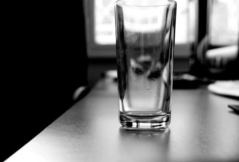 glass on the desk looking up at it