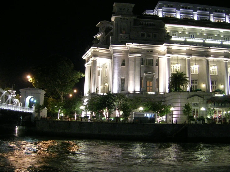 the view of the city from across the river at night