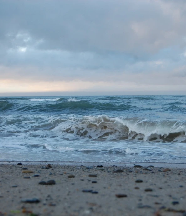 a lone wave on the coast near the shore