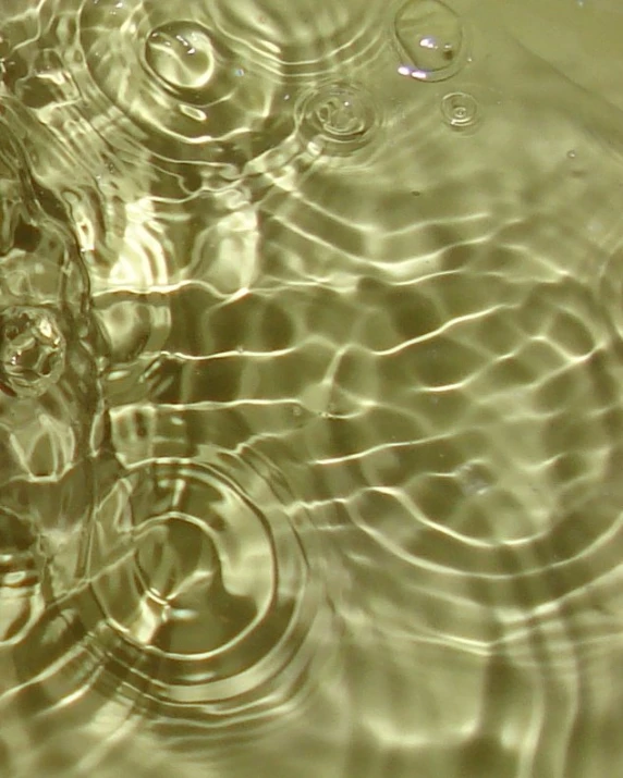 a person with an umbrella in some water