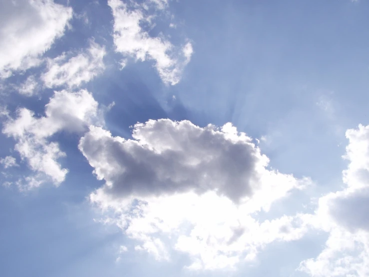 the sky is clear and blue with clouds