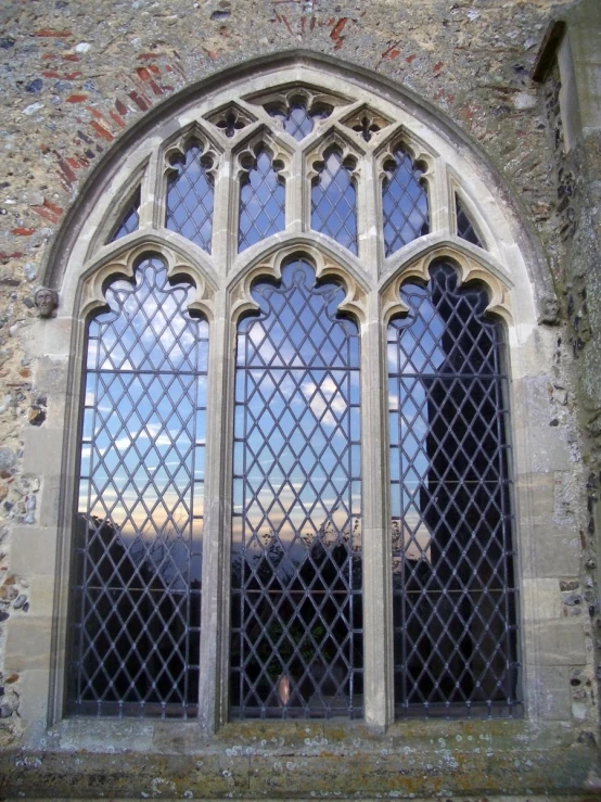 a church window that has some kind of gothic frame