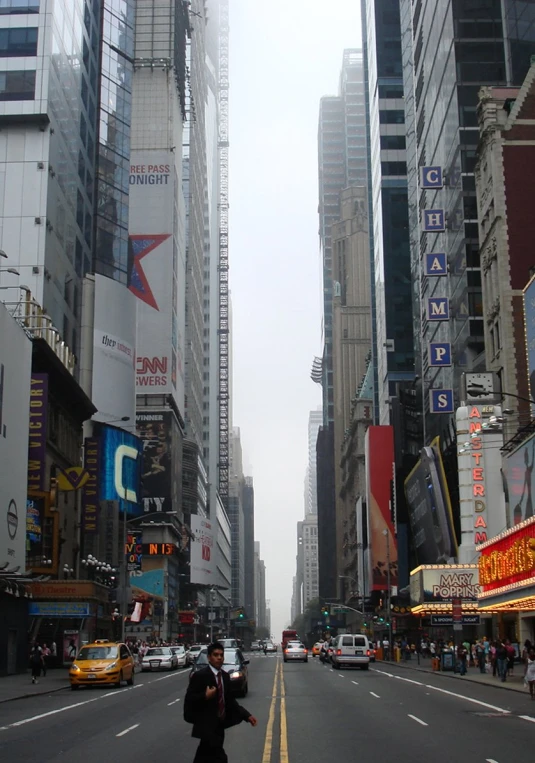 this is a street with lots of tall buildings