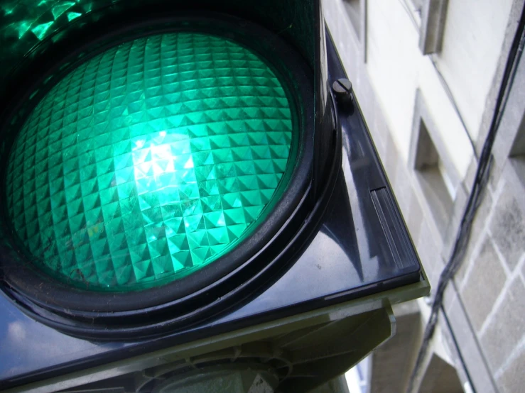 a close up of a traffic light on a pole
