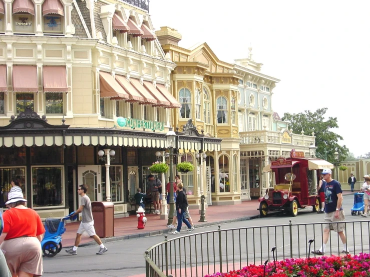 there is many different colored buildings that are on this street