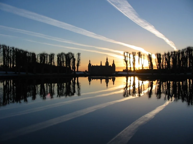 a sunset reflecting off the water and in the sky