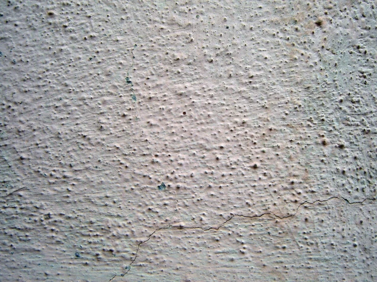 a wall with some very little bumps on it