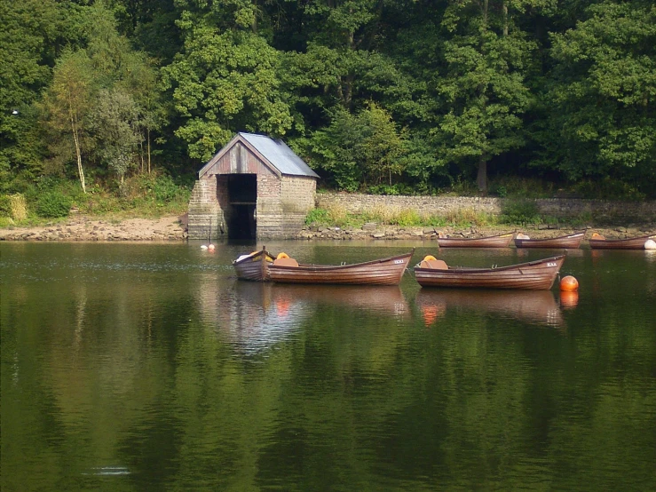 a boat dock with two boats in the water