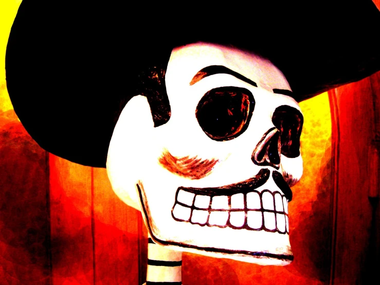 a skeleton with an open mouth wearing a large black hat