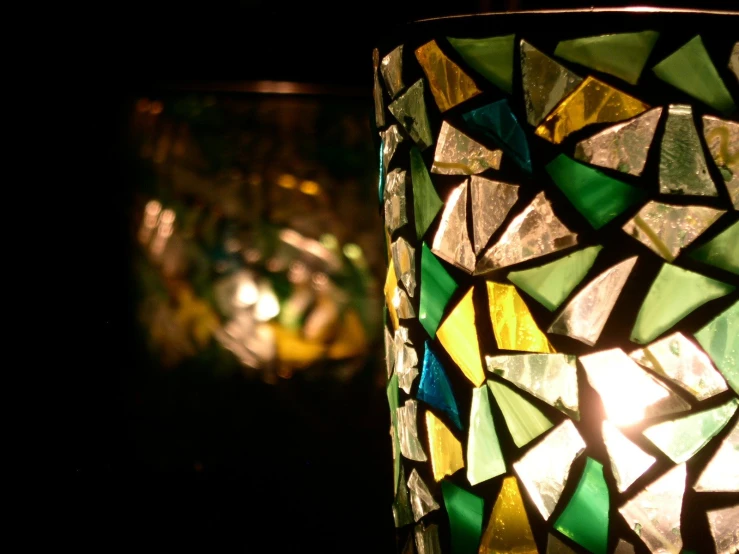 two lamps sitting next to each other on a table