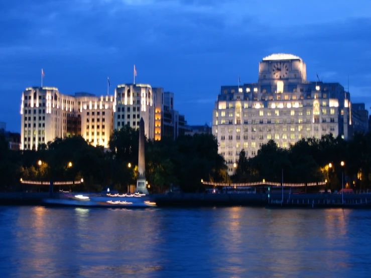 several very large buildings sitting over water