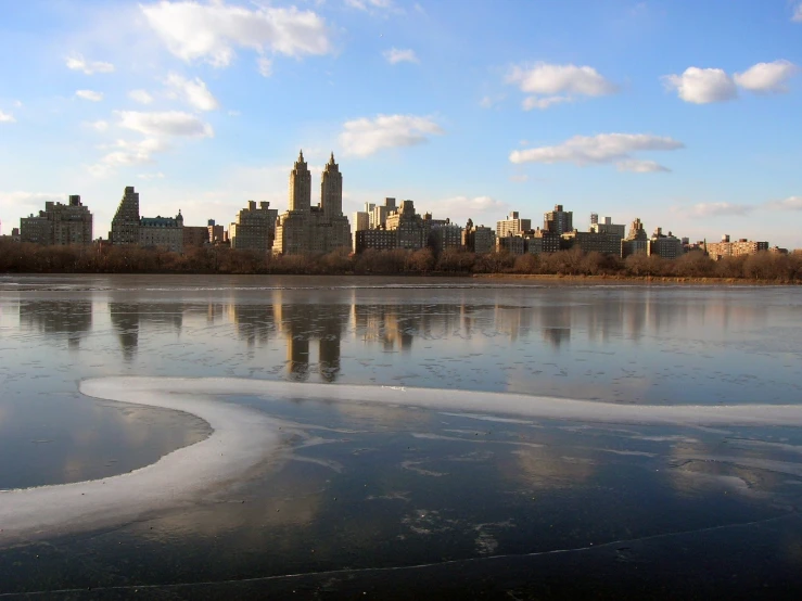 a large body of water near many buildings