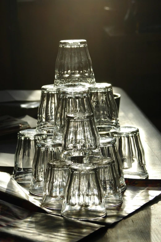 clear glass cups sitting on top of a table