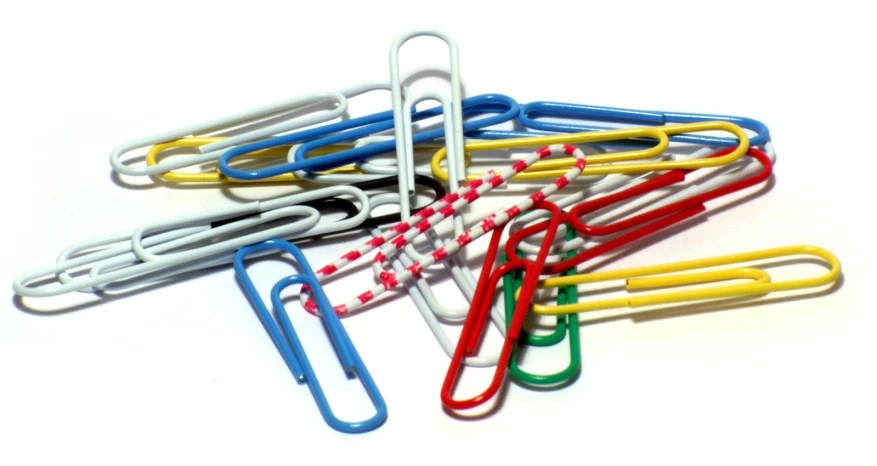 an assortment of colorful paper clips arranged in different colors