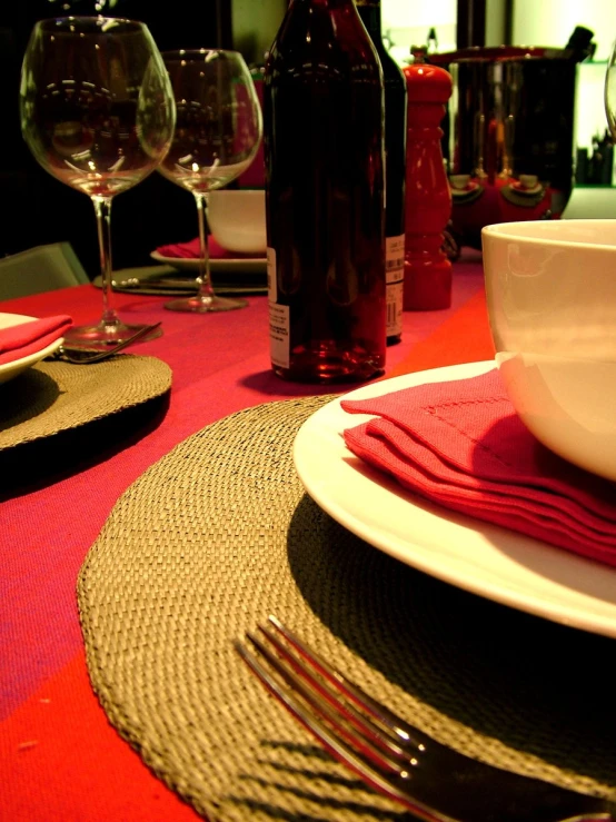 a table that has some plates and silverware on it