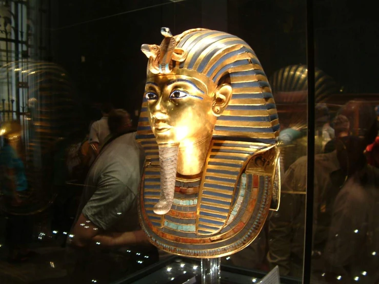 an egyptian head that looks very like gold