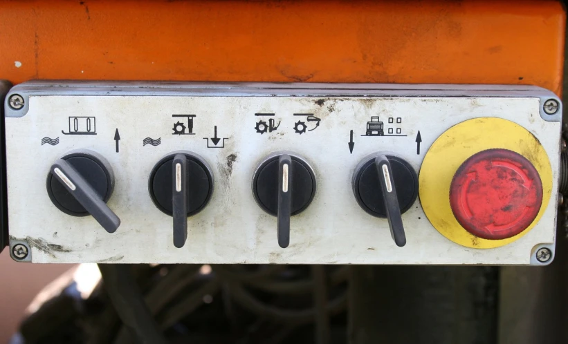 a red, yellow, and black power switch with a yellow on