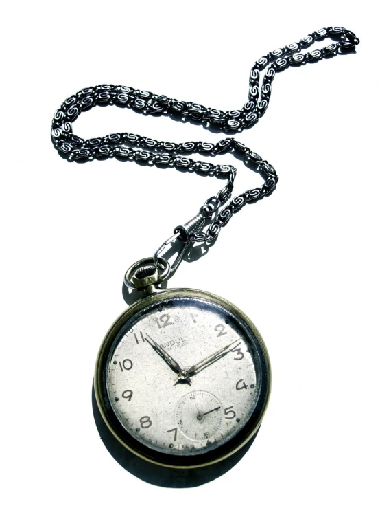a clock pendant on a necklace with a chain