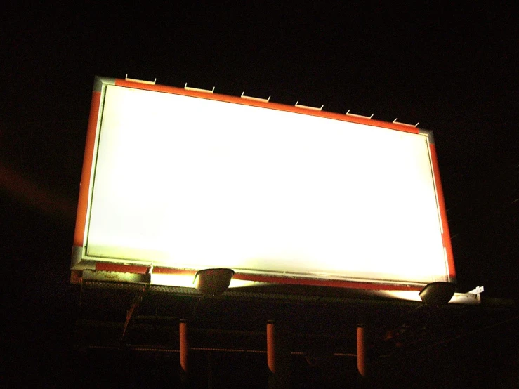 white screen with glowing red and orange accents on the screen