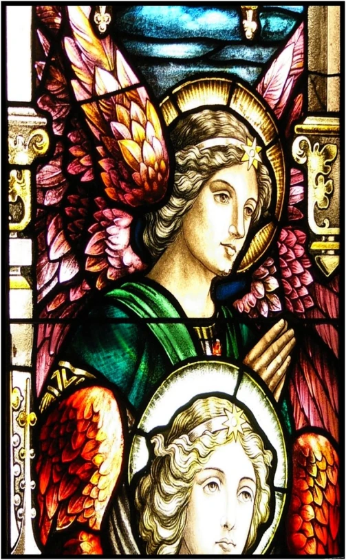 a stained glass depicting the face of an angel