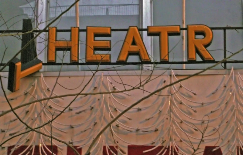 the top of a building that says heatr and is decorated with icing