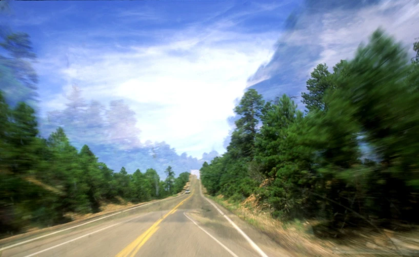 the car window is clear of people going on the road