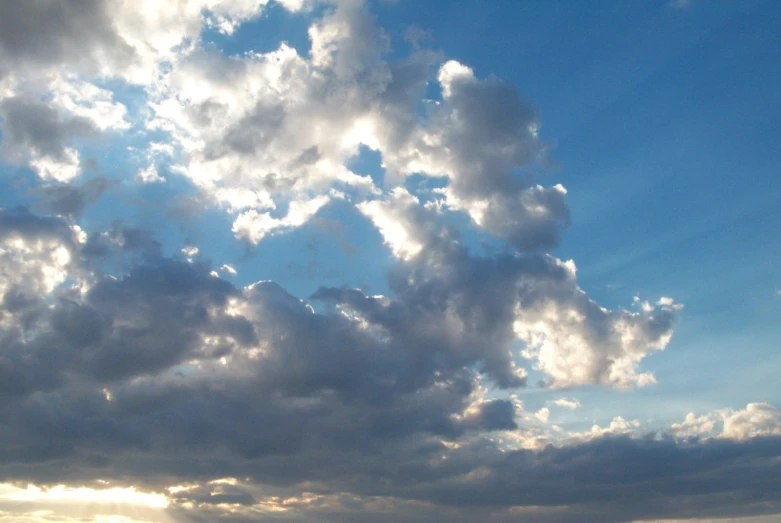 a view looking up at clouds and the ocean