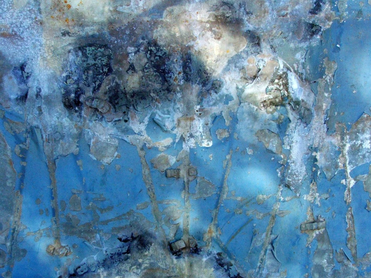 the background with blue paint and rust, is blurred