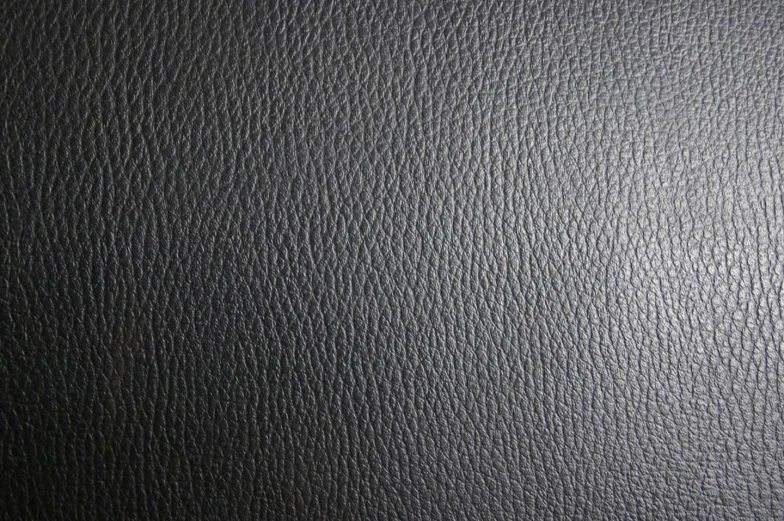 a black leather background that resembles black