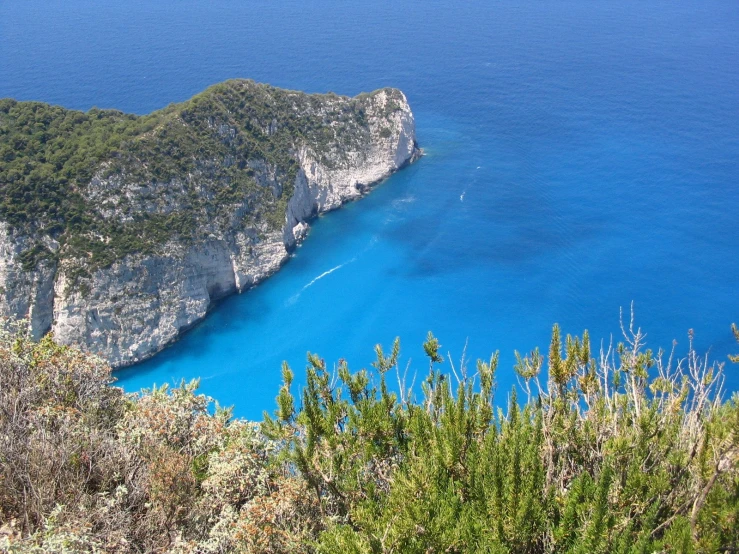 some water and mountains in the blue ocean