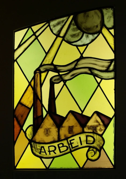 a stained glass window with a drawing of a building