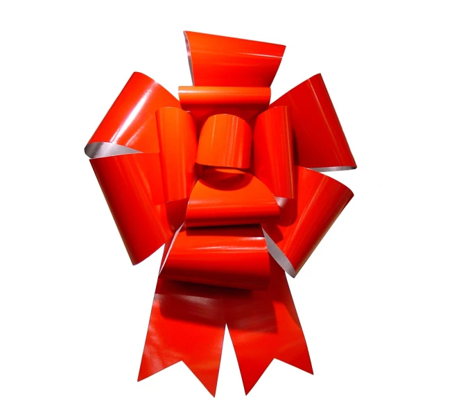 an abstractly made sculpture of large red paper