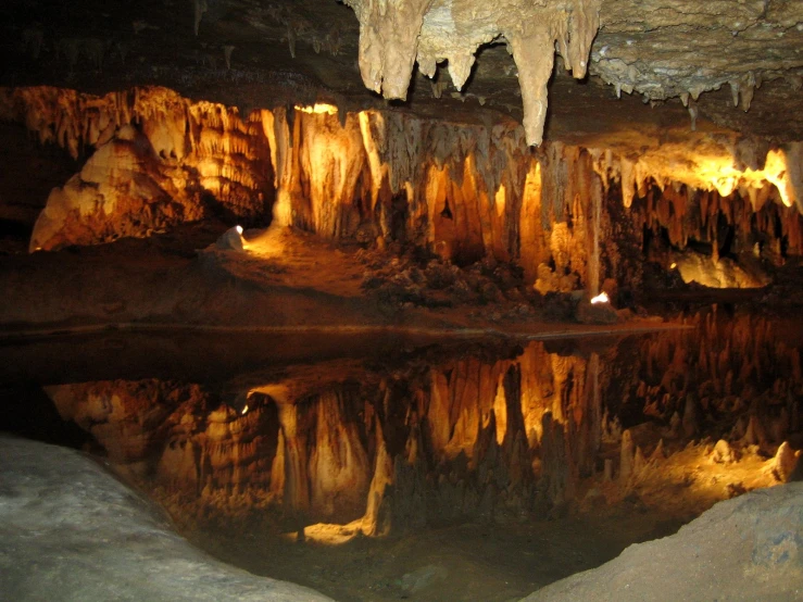 a river surrounded by lots of caves and water