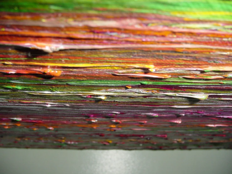 an abstract painting with various colors and patterns