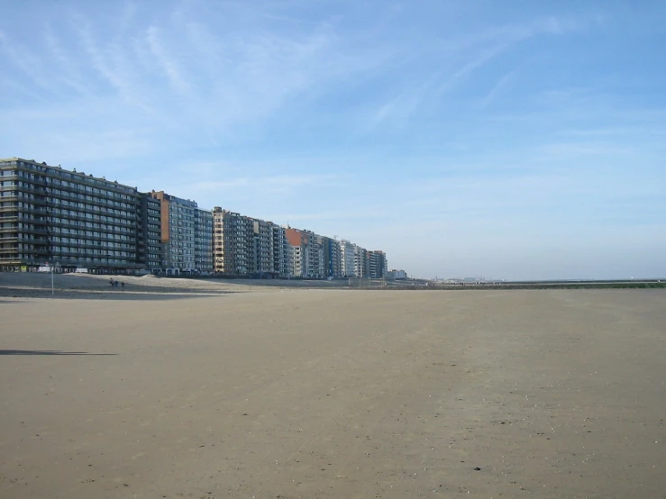 a group of buildings that are near the beach