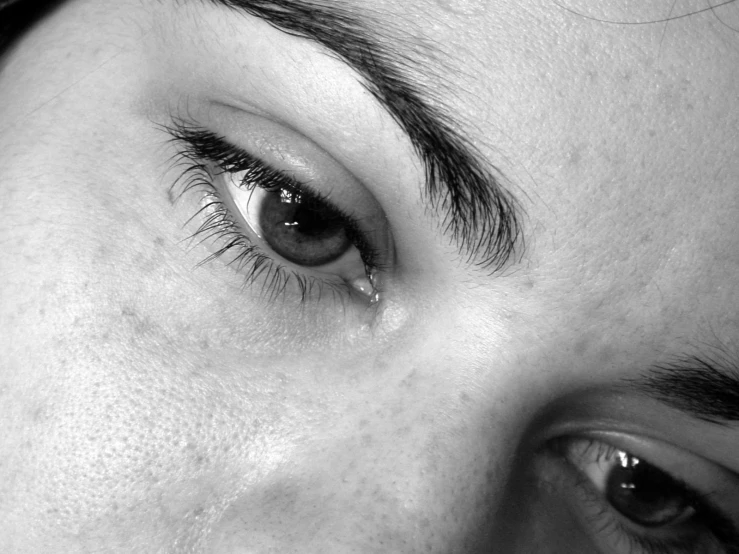 black and white po of a person with brown eyes