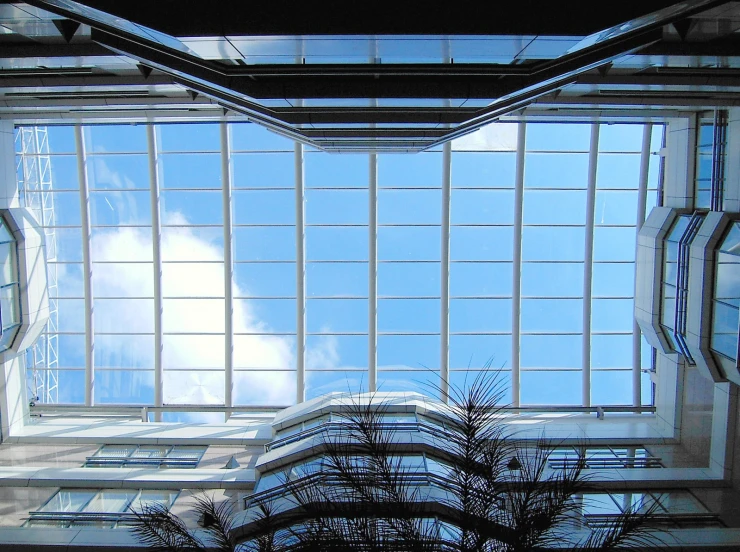 high rise buildings looking up from the bottom