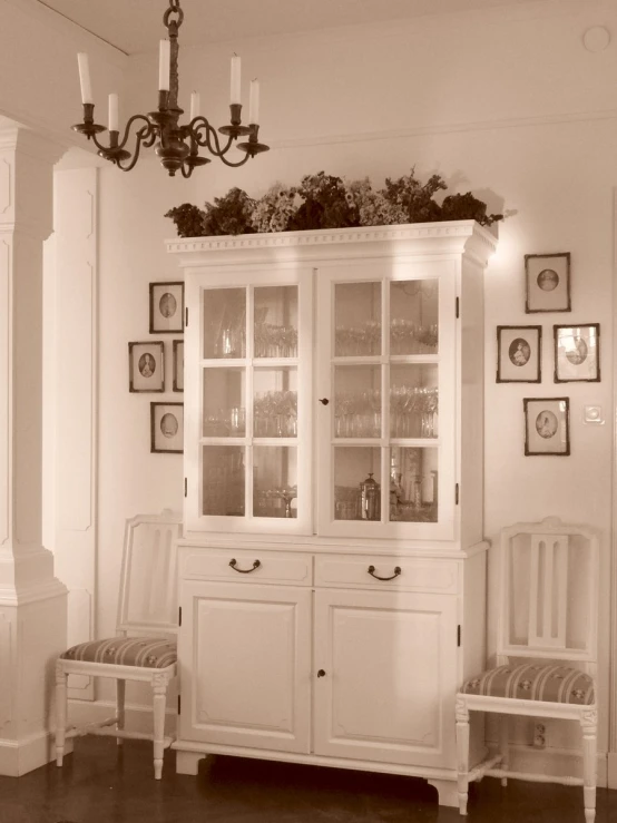 this is a black and white po of a china cabinet