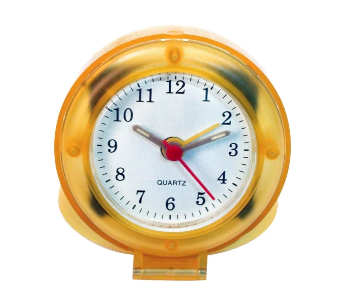 a yellow metal alarm clock on white background