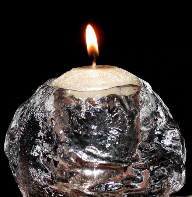 a candle with a  on the end of it