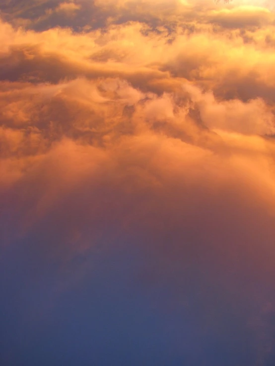 the sun shines brightly in the clouds on this beach