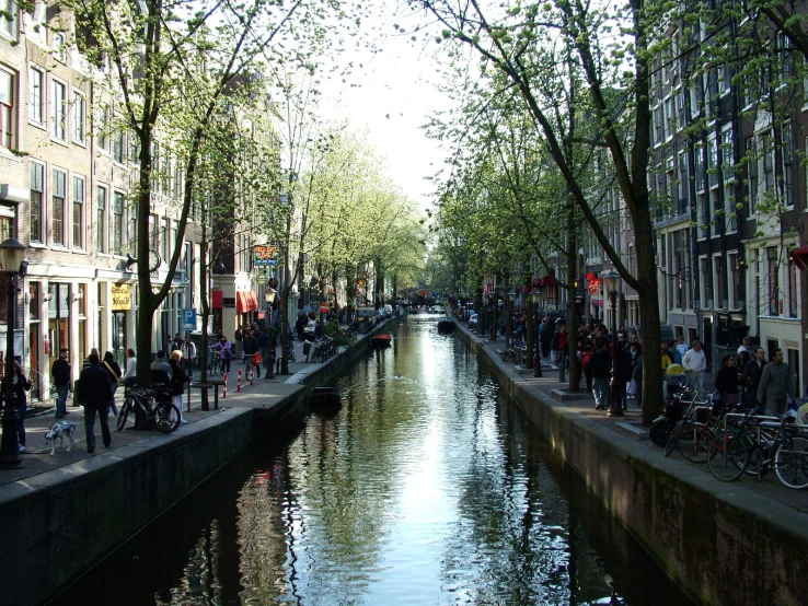 a canal in the middle of several buildings on either side