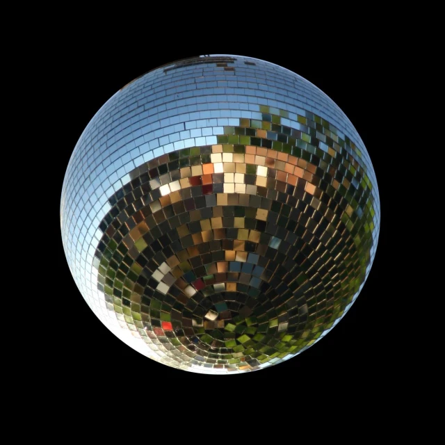 a mirrored ball that has been decorated with squares