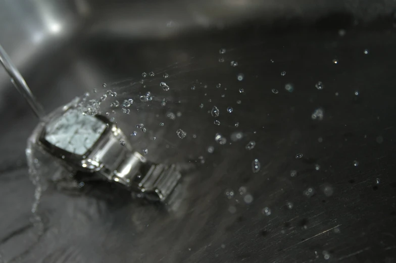 an object is falling off the surface of a sink