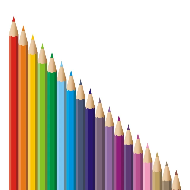 several color pencils arranged to form a rainbow